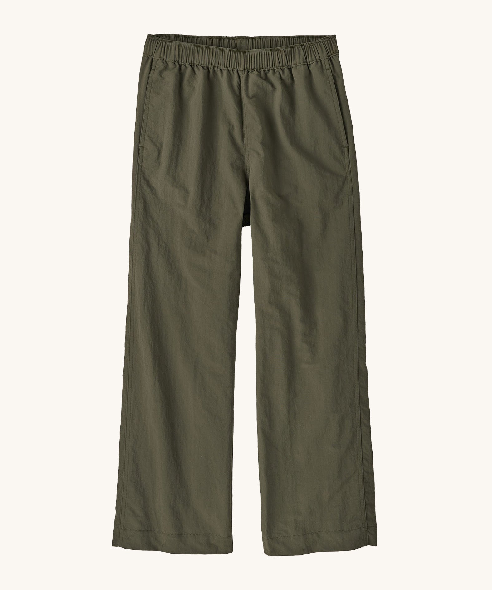 Front view of Patagonia Women’s Outdoor Everyday Pants laid flat on a light background, showing wide-leg cropped trousers in dark khaki green with an elasticated high-rise waistband and simple, clean construction.