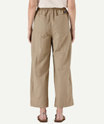 Back view of a model wearing Patagonia Women’s Outdoor Everyday Pants in Seabird Grey, showing the wide-leg cropped cut, elasticated waistband, and two rear patch pockets.
