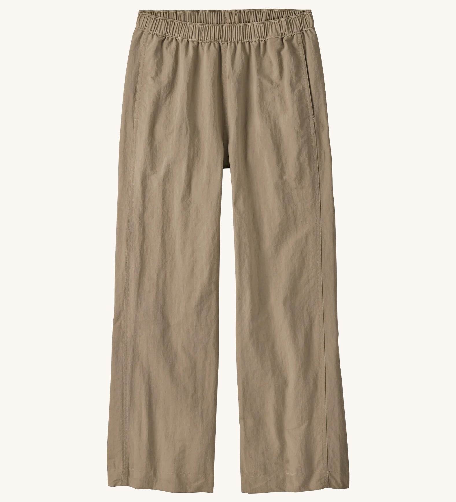 Flat lay front view of Patagonia Women’s Outdoor Everyday Pants in Seabird Grey, showing the wide-leg cropped shape and elasticated waistband on a light background.