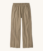 Flat lay front view of Patagonia Women’s Outdoor Everyday Pants in Seabird Grey, showing the wide-leg cropped shape and elasticated waistband on a light background.