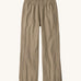 Flat lay front view of Patagonia Women’s Outdoor Everyday Pants in Seabird Grey, showing the wide-leg cropped shape and elasticated waistband on a light background.
