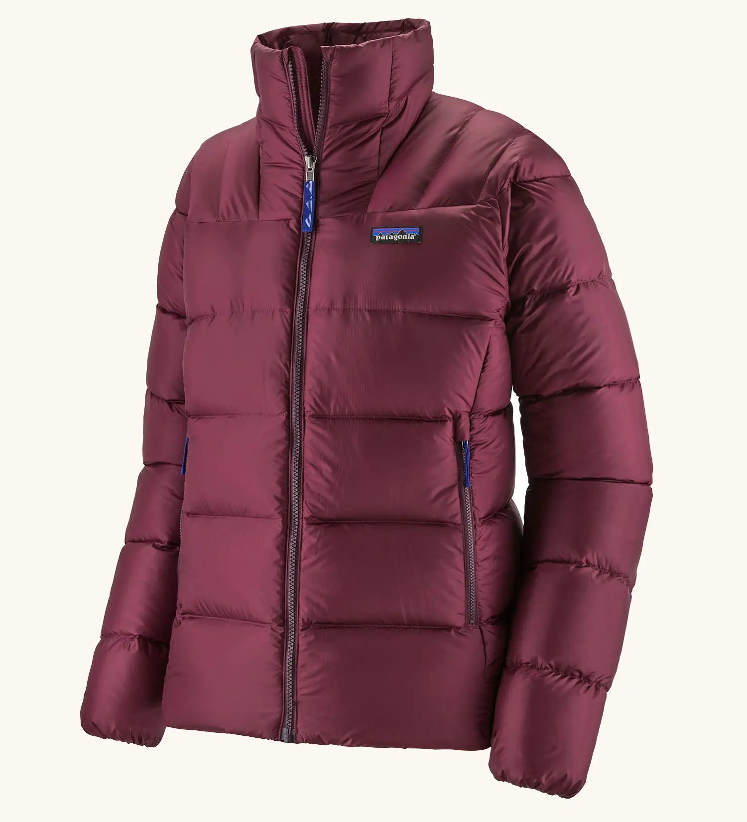 Patagonia women's fitz roy down insulated lightweight windproof jacket in berry fig. Two zippered hand warmer pockets.