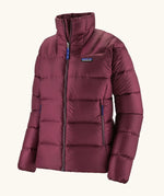 Patagonia women's fitz roy down insulated lightweight windproof jacket in berry fig. Two zippered hand warmer pockets.