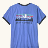 Patagonia women's fitz roy foothills organic cotton ringer tee in diver blue. Mountain scape illustration on front.