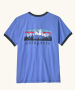 Patagonia women's fitz roy foothills organic cotton ringer tee in diver blue. Mountain scape illustration on front.