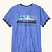 Patagonia women's fitz roy foothills organic cotton ringer tee in diver blue. Mountain scape illustration on front.
