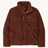 Patagonia women's Fjord jacket. A dark red/orange corduroy coat with a thick collar for warmth. Features 2 side pockets and a logo patch stitched on the left chest.