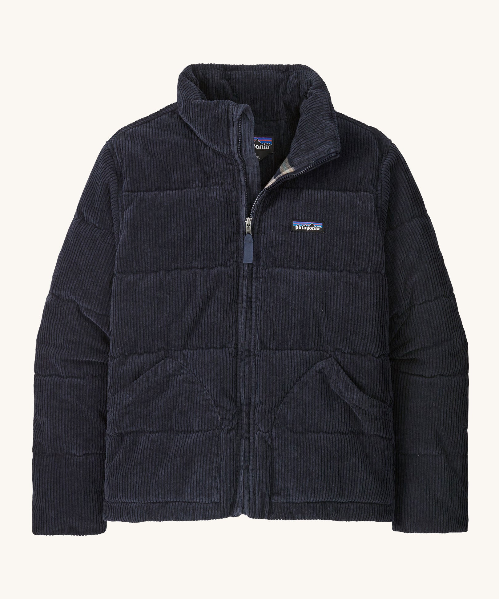 Patagonia women's Fjord jacket. A dark blue corduroy coat with a thick collar for warmth. Features 2 side pockets and a logo patch stitched on the left chest.