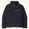 Patagonia women's Fjord jacket. A dark blue corduroy coat with a thick collar for warmth. Features 2 side pockets and a logo patch stitched on the left chest.