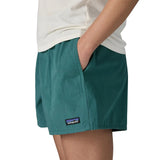 Patagonia Women’s Funhoggers™ Shorts Wetland Blue side view with hand in pocket and P-6 logo