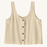 Patagonia women's sleeveless garden island top in light cream whole weave material. Button up closure with four brown buttons.