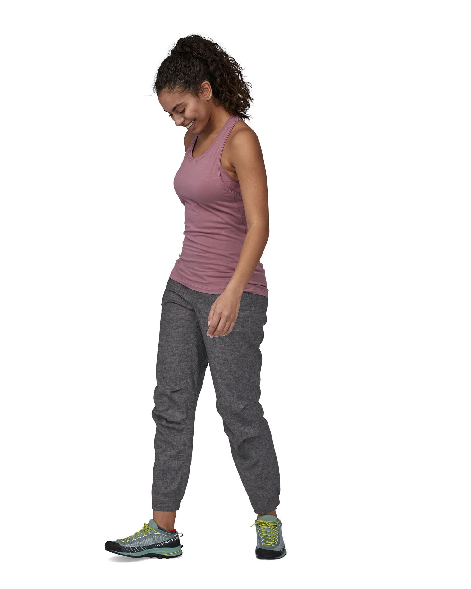 Patagonia women's hampi rock pants in regular ink black being worn. The length reaches just above the ankle.