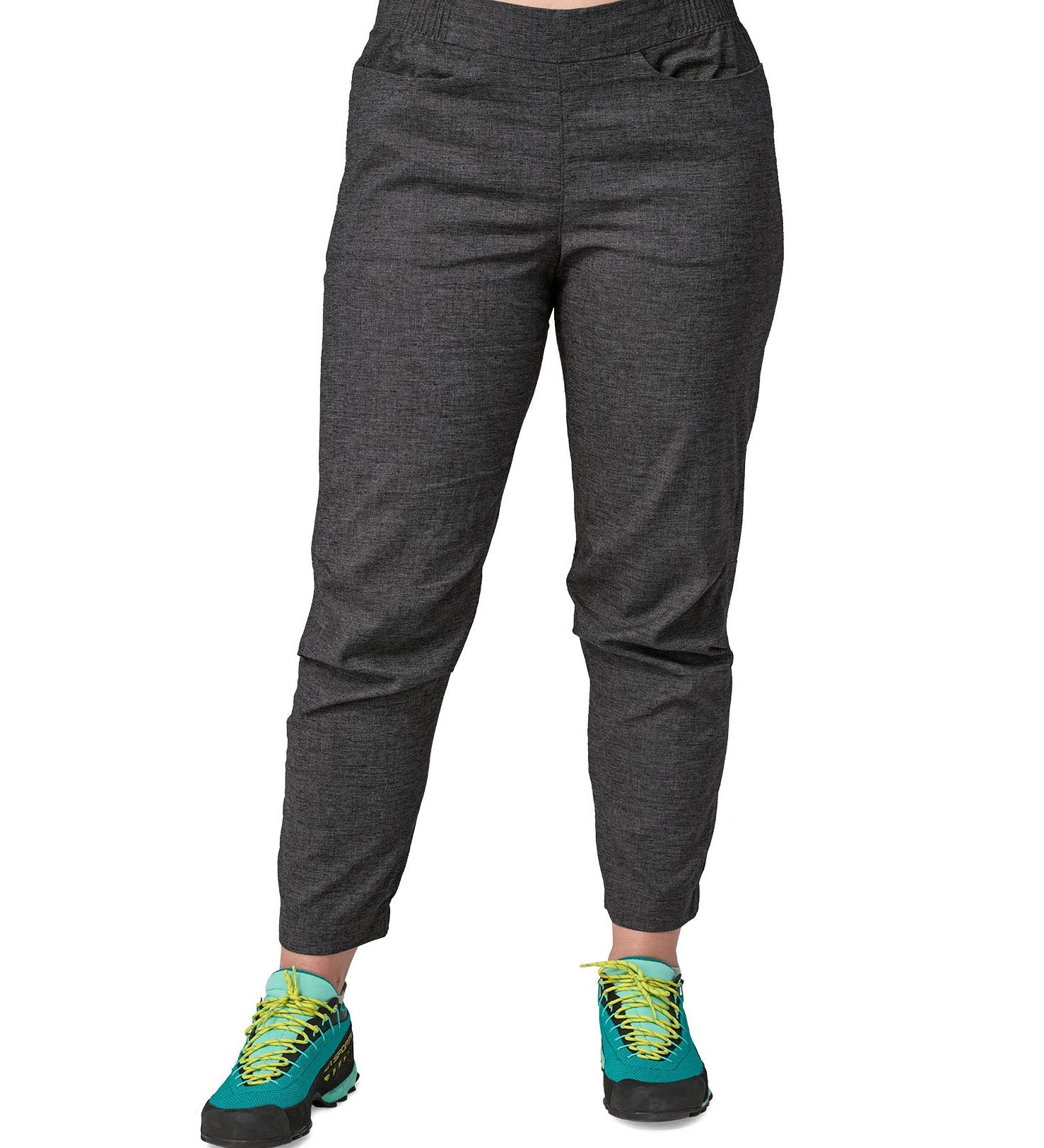 close up of the Patagonia women's hampi rock pants in regular ink black being worn. The cuffs and waist are elasticated.