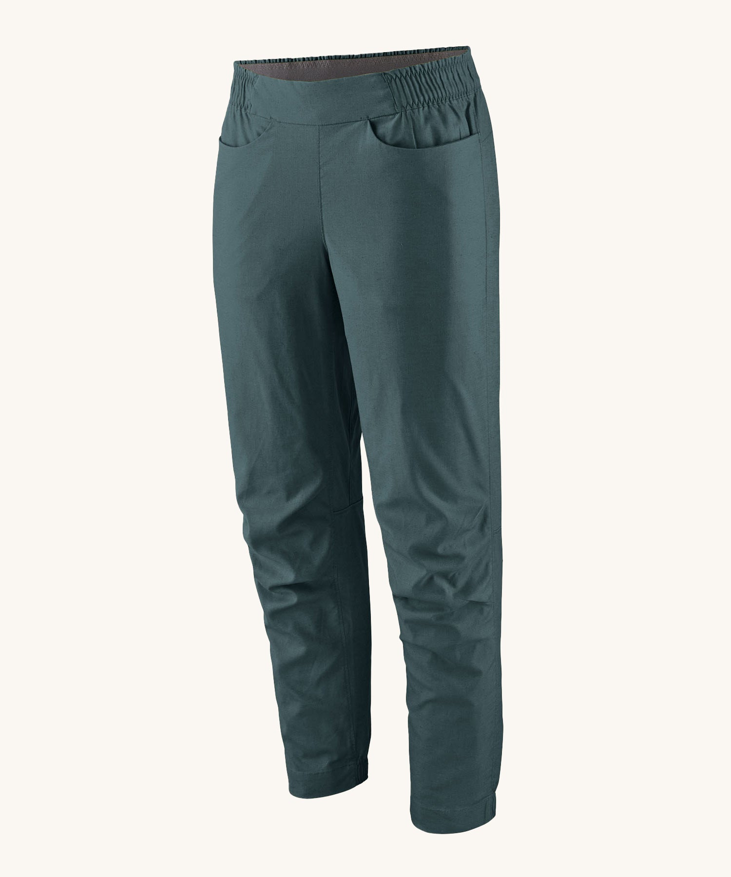 The Patagonia Women's Hampi Rock Pants in a Tidal Teal colour on a plain background. 
