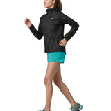 Patagonia women's houdini jacket in a back colour worn by a running woman