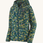Patagonia women's houdini jacket in a turquoise colour with a retro flower design on a cream background.