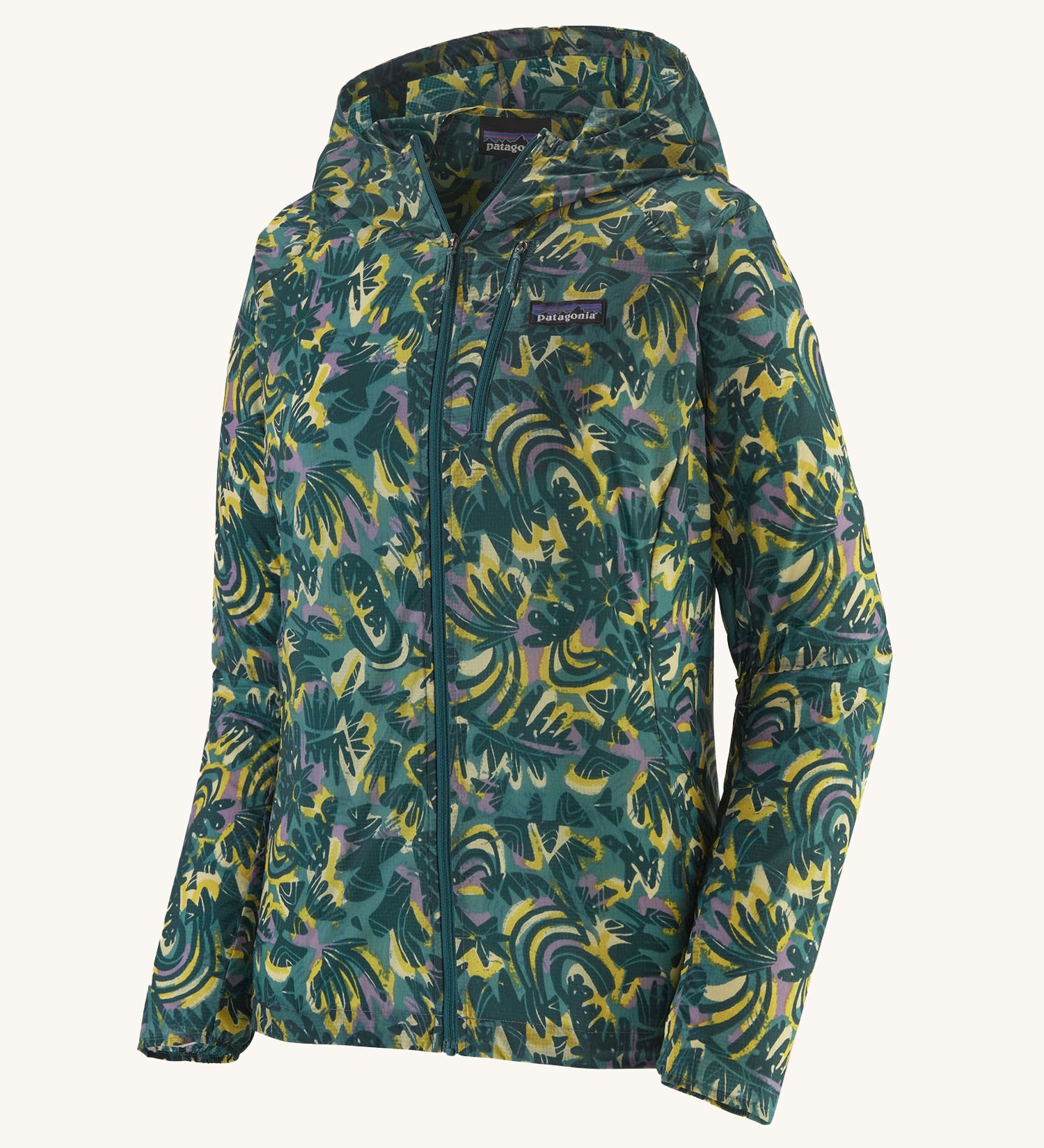Patagonia women's houdini jacket in a turquoise colour with a retro flower design on a cream background.