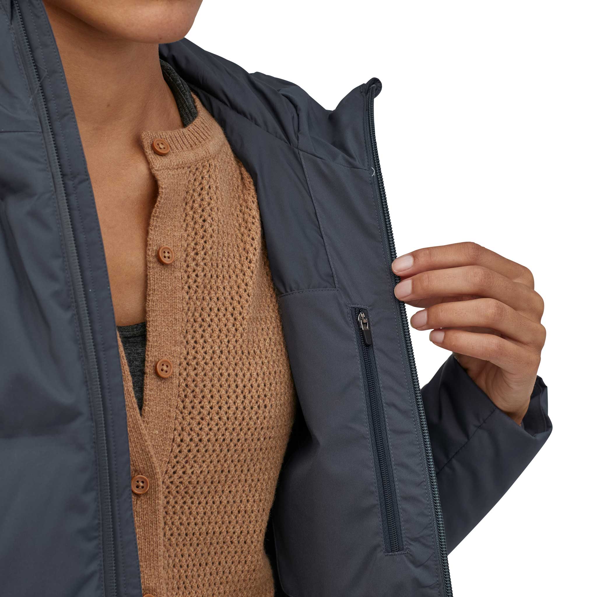 A close up of the zip pocket inside the Patagonia Women's Jackson Glacier Jacket in a Smolder Blue colour.