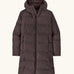 Patagonia women's waterproof jackson glacier parka in den brown with a water-resistant two-way front zip, insulated  fixed hood and two high-volume handwarmer pockets.