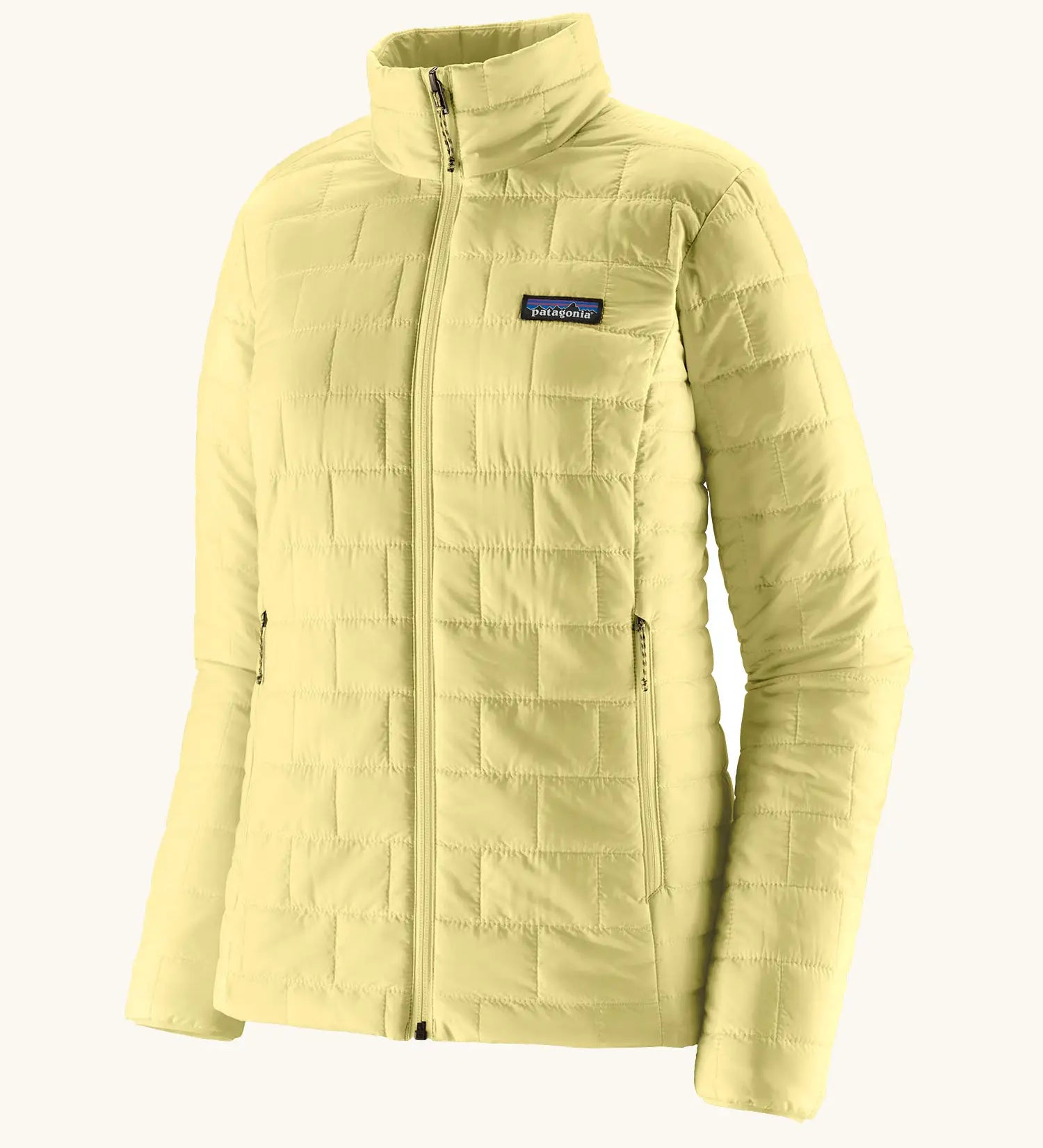 Patagonia women's lightweight nano puff insulated jacket in light vellum green with zippered handwarmer pockets.
