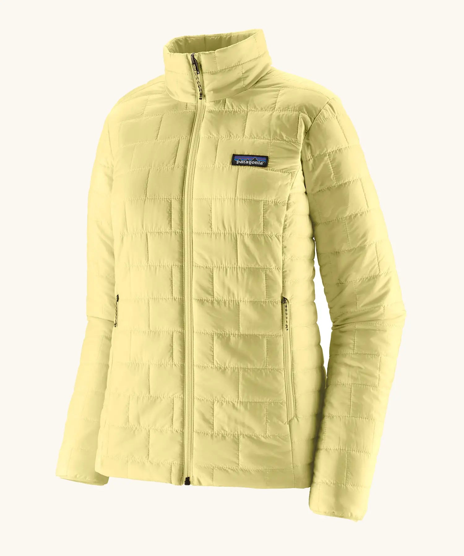 Patagonia women's lightweight nano puff insulated jacket in light vellum green with zippered handwarmer pockets.
