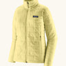 Patagonia women's lightweight nano puff insulated jacket in light vellum green with zippered handwarmer pockets.