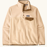 Patagonia women's lightweight synchilla fleece snap-t pullover in natural with brown chest pocket and bininding in sleeves and collar.