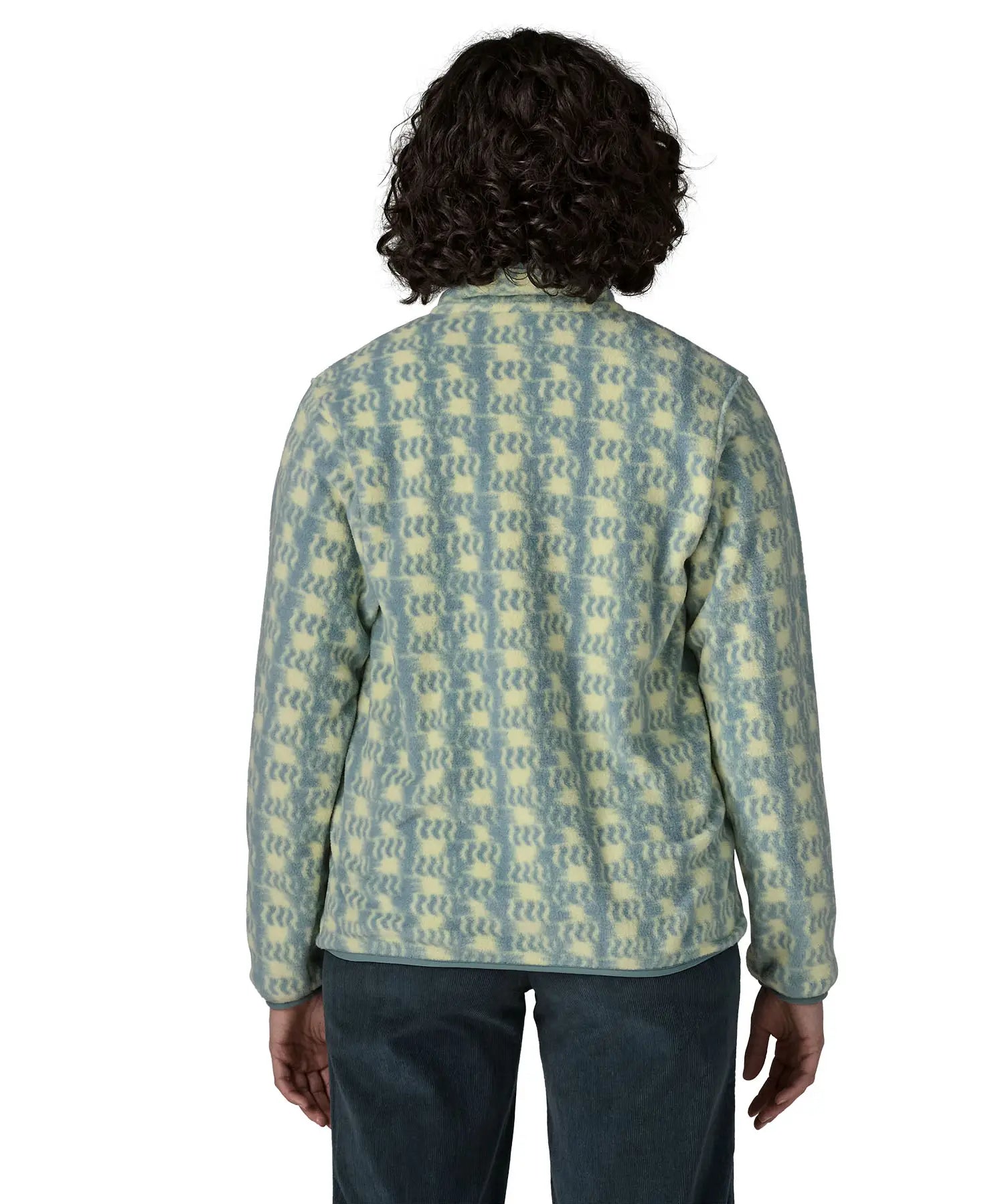 Woman wearing the Patagonia women's lightweight synchilla fleece snap-T pullover in a sun Quilt pattern in blue sage, view of back