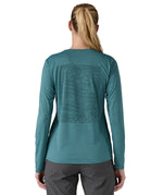 Patagonia women's long sleeve capilene top in turquoise mountain outline design back detail