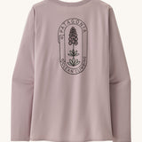 The back of the Patagonia Women's Long-Sleeved Capilene Cool Shirt with a  Clean Climb Bloom graphic in an Echo Purple colour.