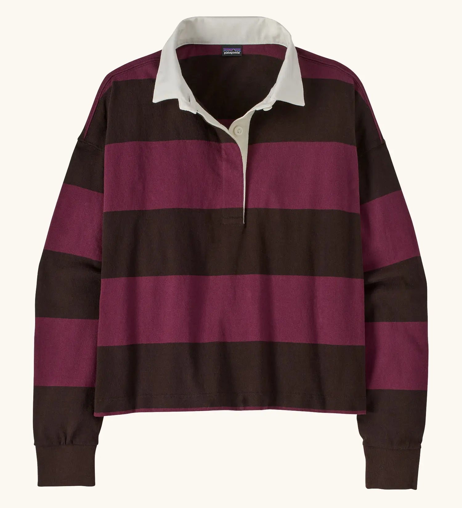 Patagonia women's long sleeved cotton rugby shirt in wide stripe berry fig with white collar.