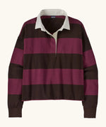 Patagonia women's long sleeved cotton rugby shirt in wide stripe berry fig with white collar.
