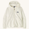 Patagonia women's micro fleece hooded jacket in white on a cream background.