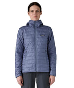 Patagonia Women's Nano Puff Hoody Jacket Current Blue lightweight insulated jacket worn by model front view with hood down