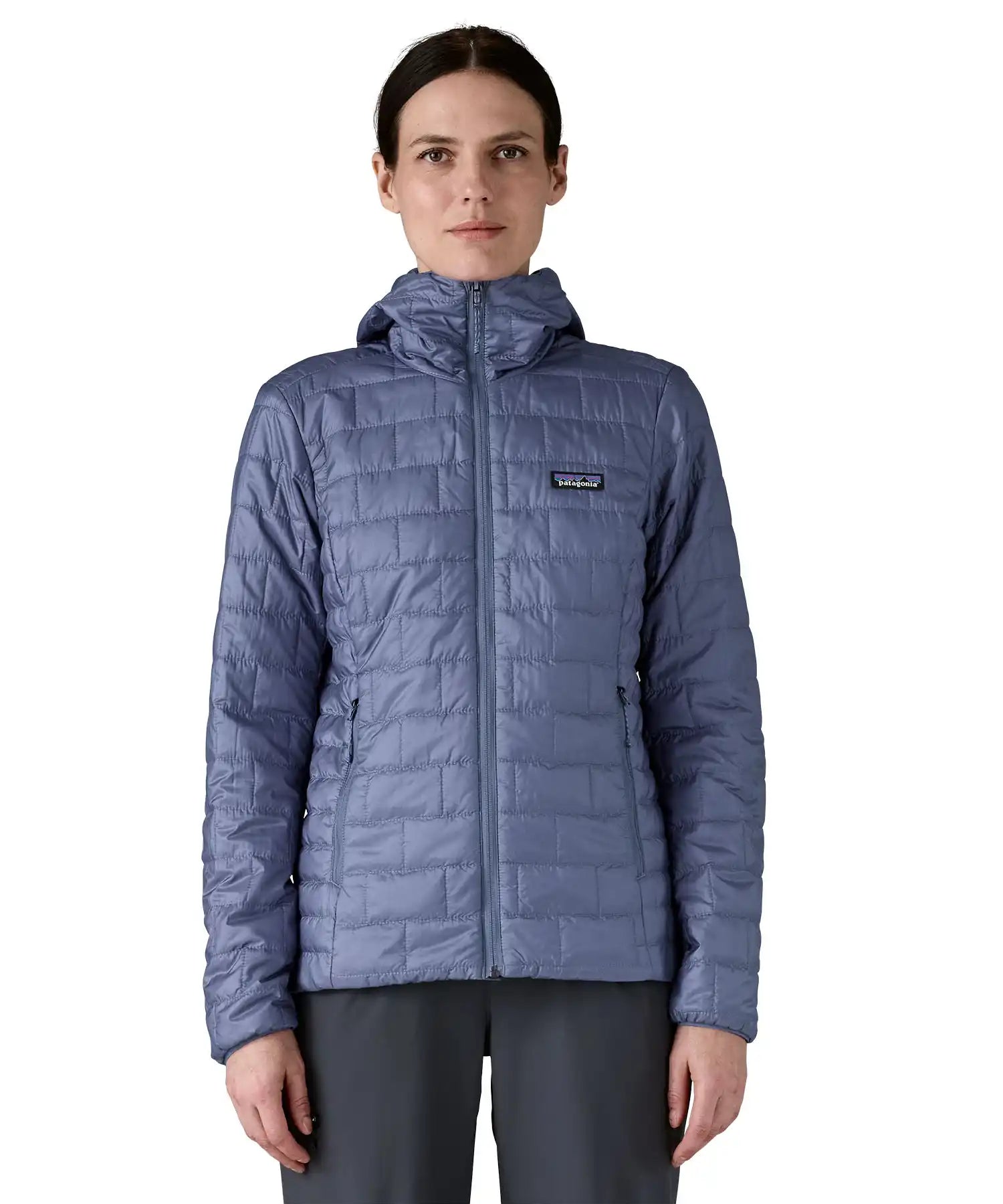 Patagonia Women's Nano Puff Hoody Jacket Current Blue lightweight insulated jacket worn by model front view with hood down