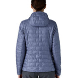 Patagonia Women's Nano Puff Hoody Jacket Current Blue rear view worn by model showing hood and brick quilted insulation