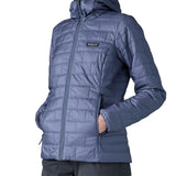 Patagonia Women's Nano Puff Hoody Jacket Current Blue lightweight insulated jacket front close-up showing brick quilting, zip closure and handwarmer pockets