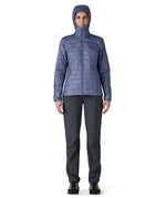 Patagonia Women's Nano Puff Hoody Jacket Current Blue lightweight insulated jacket worn zipped up by model with hood up full body view
