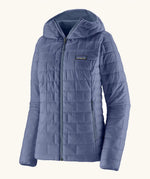 Patagonia Women's Nano Puff Hoody Jacket Current Blue lightweight insulated jacket with hood front angled view showing brick quilting and zip handwarmer pockets