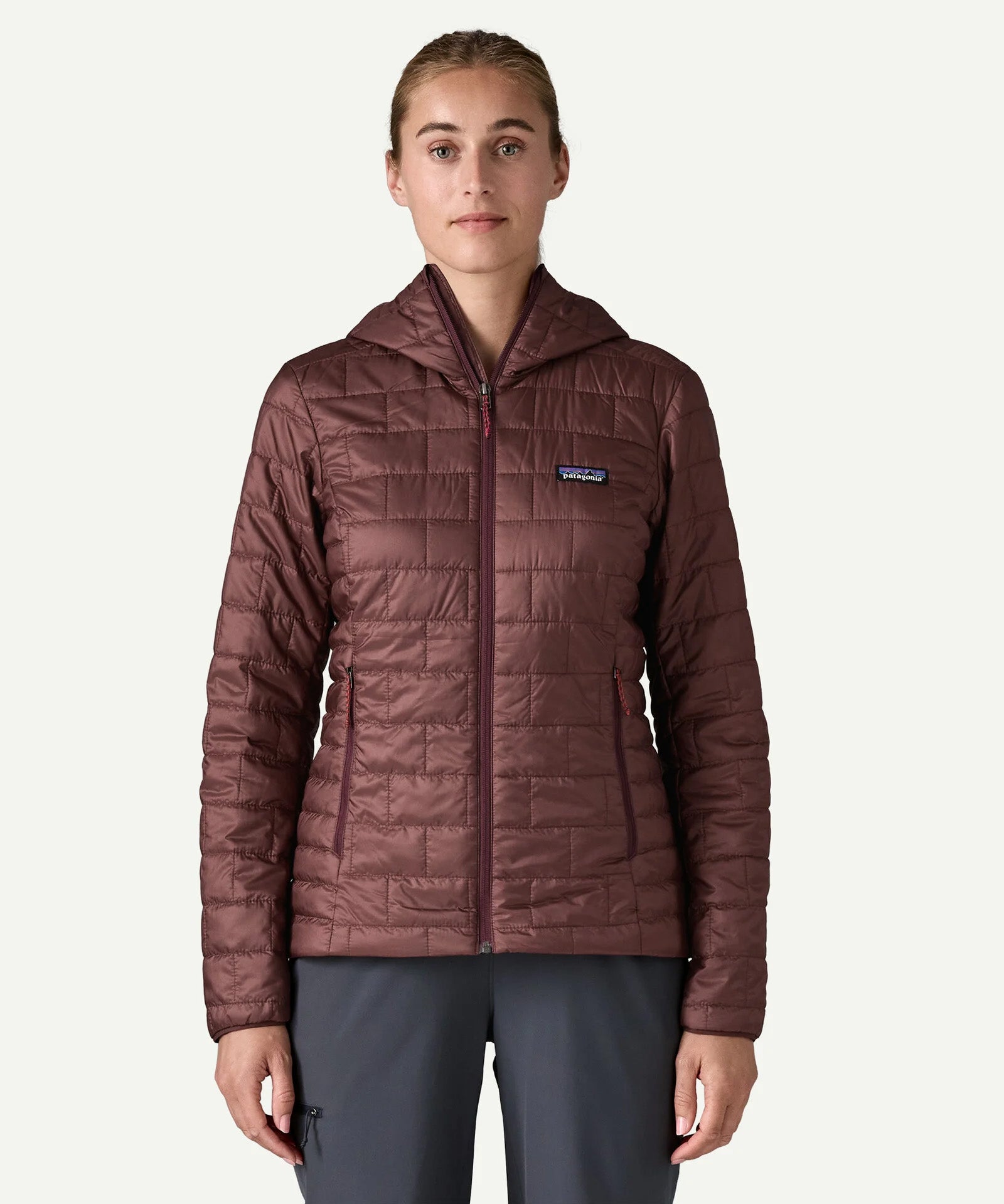 Front close up of the Patagonia Women’s Nano Puff Hoody in Dark Ruby with PrimaLoft Gold Eco insulation and lightweight packable outdoor design.