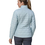 Patagonia women's nano puffer jacket in a chilled blue colour back detail
