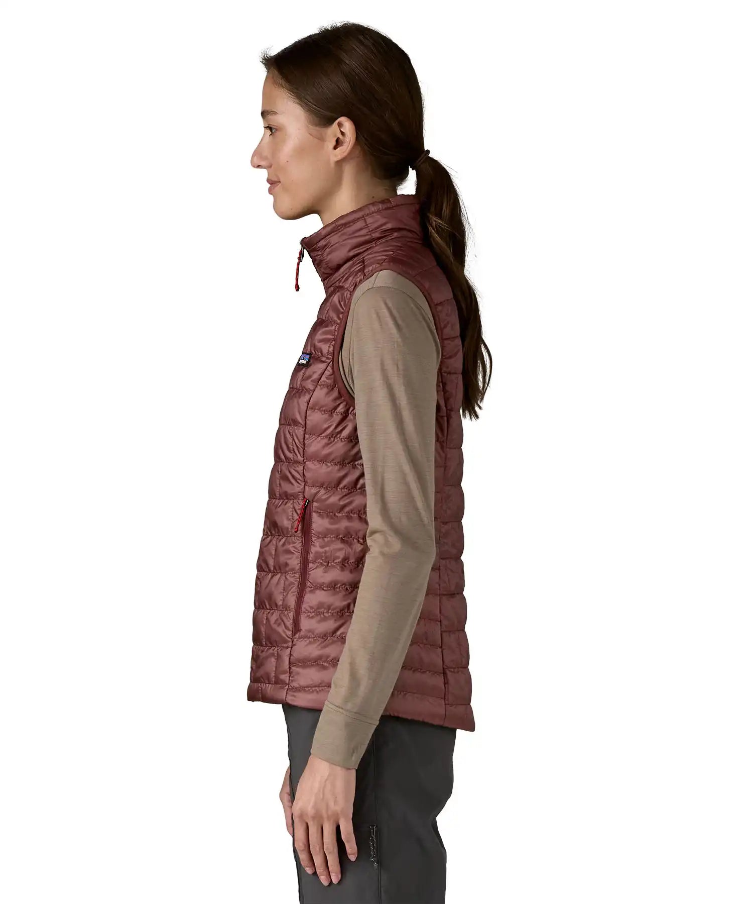 Patagonia Women's Nano Puff Vest Dark Ruby lightweight insulated gilet side profile worn by model