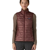 Patagonia Women's Nano Puff Vest Dark Ruby lightweight insulated gilet worn by model front view showing Patagonia chest logo and quilting