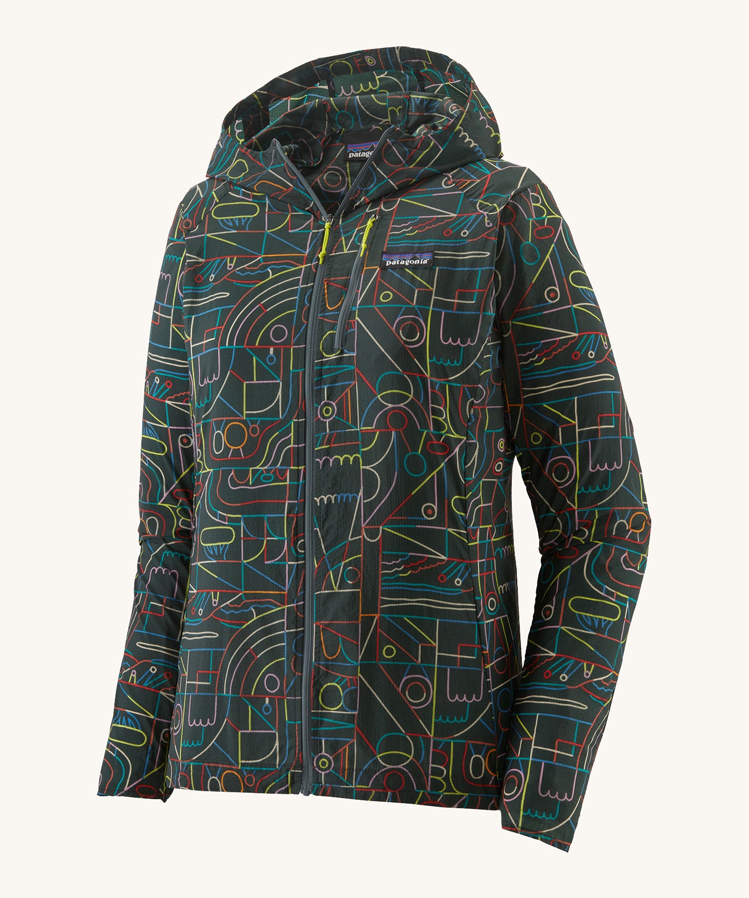 Patagonia Houdini jacket multicoloured lines and nouveau green colour on a cream background. 