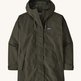 A Patagonia Women's Outdoor Everyday Rain Jacket in a Pine Needle Green colour on a plain background.