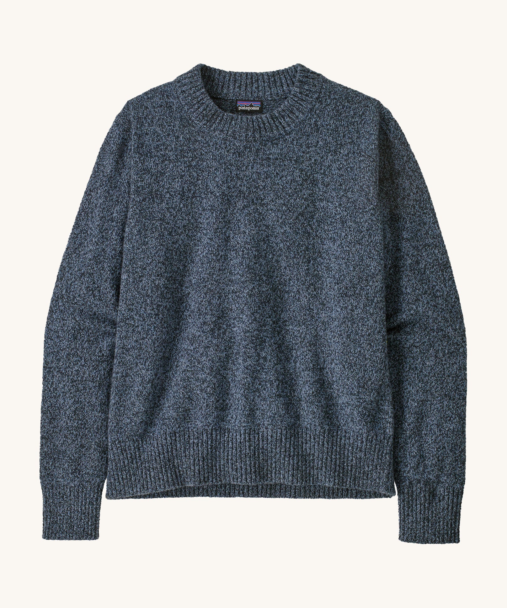 Patagonia Women's Recycled Wool-Blend Crewneck Sweater. A thick knit jumper in dark blue with dappled design