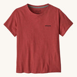 A view of the front of the Patagonia women's logo t-shirt in potters red. A short sleeve t-shirt with a large brand logo on the back and a small logo on the left chest area on the front. This t-shirt is a part of a wide range of Patagonia clothing and accessories available here at Babipur.  