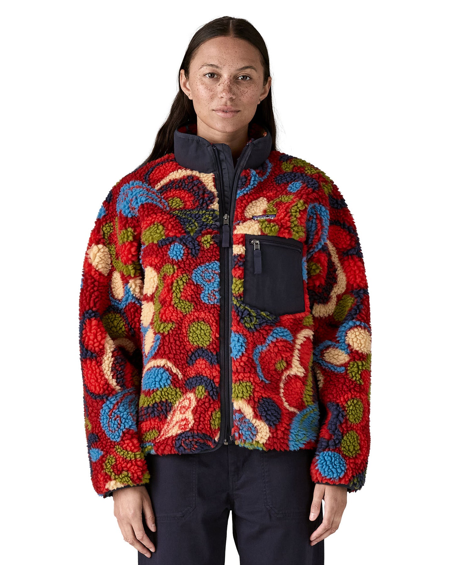 Front view of the Patagonia river river amanita red retro fleece jacket worn by an adult. 
