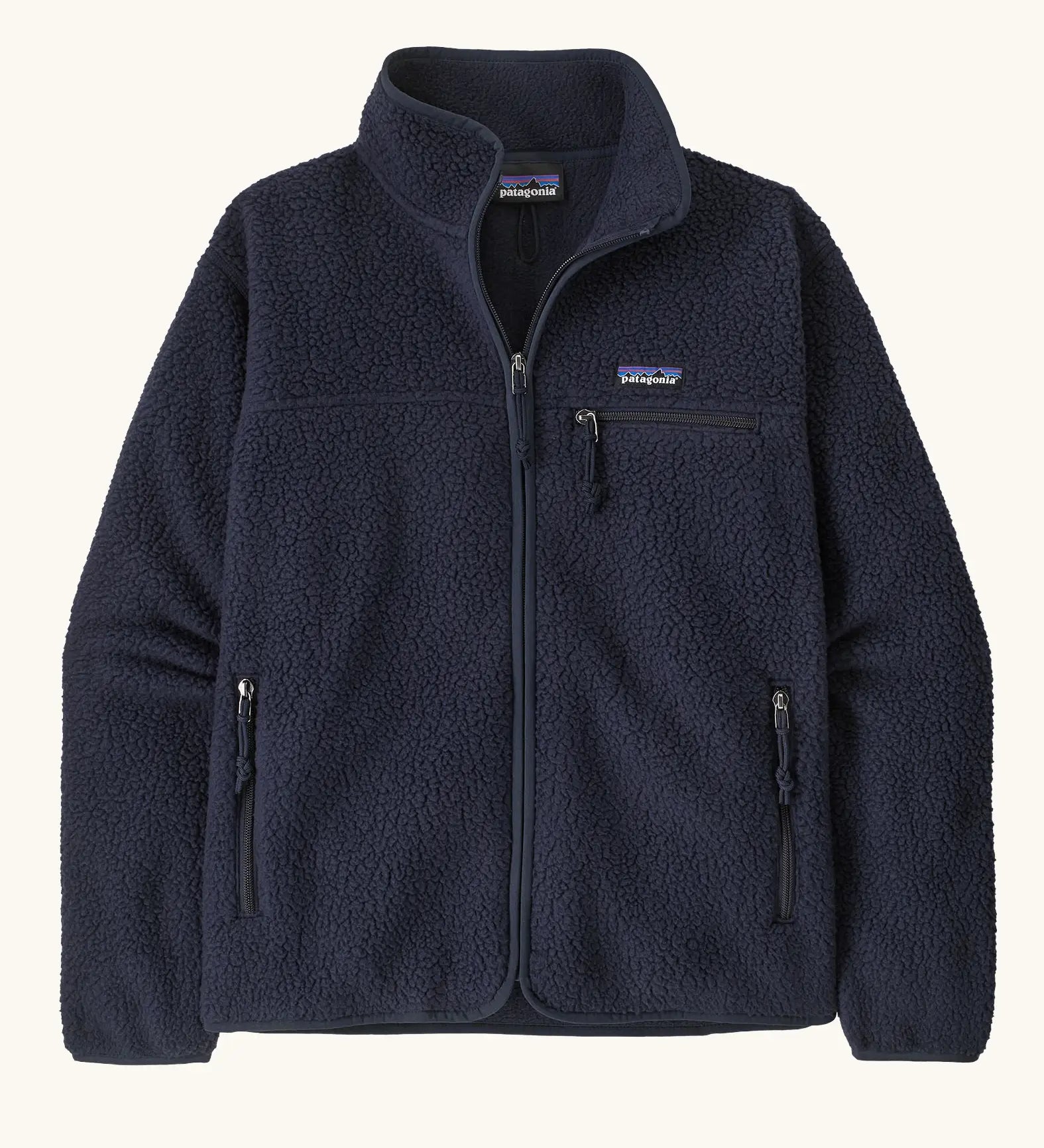 Patagonia women's retro pile fleece jacket in sunken blue with zippered chest pocket and handwarmer pockets.