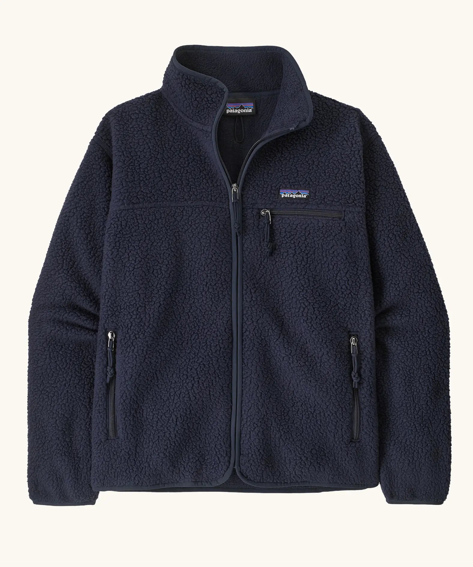 Patagonia women's retro pile fleece jacket in sunken blue with zippered chest pocket and handwarmer pockets.